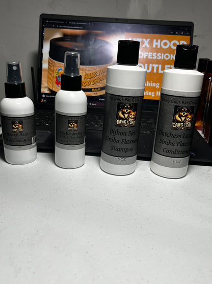 Set of hair care products on a white surface with a blurred background